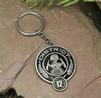 HUNGER GAMES DISTRICT 12 METAL KEYCHAIN